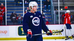 Swedish Athlete Nicklas Backstrom In Blue Jersey Wallpaper