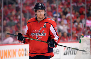 Swedish Athlete Nicklas Backstrom In Face-off Against Tampa Bay Lightning Wallpaper