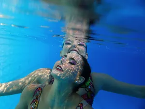 Synchronized Swimming Underwater Shot Wallpaper