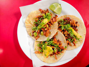 Tacos Al Pastor With Pineapple Slices Wallpaper