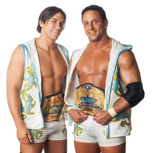 Tag Team Champions Posing With Belts Wallpaper