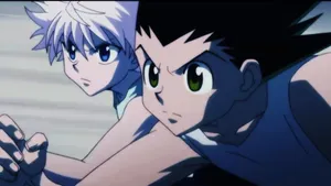 Tag Team Duel - Killua And Gon Fight Together Wallpaper