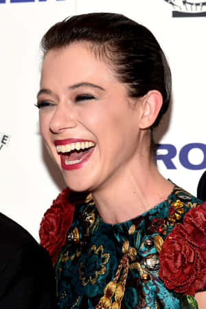 Tatiana Maslany Laughingat Event Wallpaper