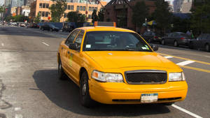 Taxi In The Middle Of Road Wallpaper