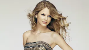 Taylor Swift Exudes Confidence And Poise In A Glittery Blue Dress Wallpaper