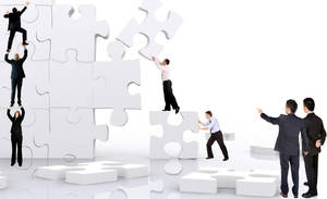 Teamwork Men Solving Jigsaw Puzzle Wallpaper
