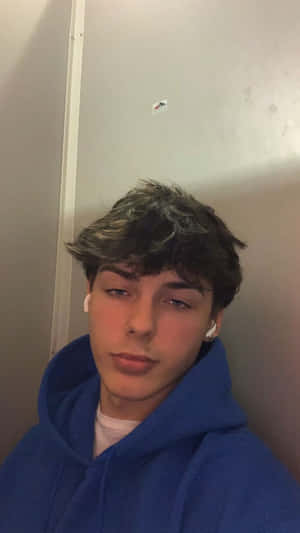 Teen Boyin Blue Hoodie Wallpaper