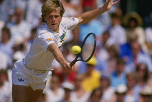 Tennis Legend Stefan Edberg Executing A Powerful Backhand Stroke. Wallpaper