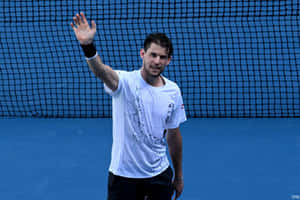 Tennis Player Wavingon Court Wallpaper