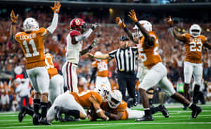 Texas Football On Ground Wallpaper