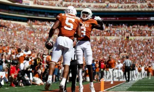 Texas Football Spreading Arms Wallpaper