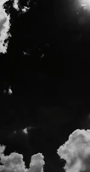 The Artful Beauty Of Black And White Clouds Wallpaper