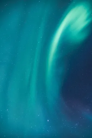 The Aurora Borealis Is Seen In The Sky Wallpaper