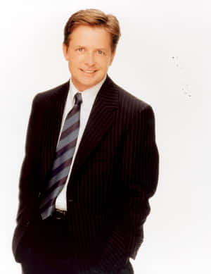 The Enigmatic Smile Of Michael J. Fox Wallpaper