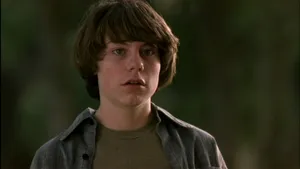 The Ensemble Cast Of Almost Famous In A Dramatic Snapshot Wallpaper