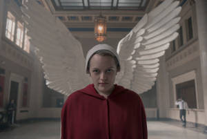 The Handmaid's Tale June Against Statue Of Wings Wallpaper