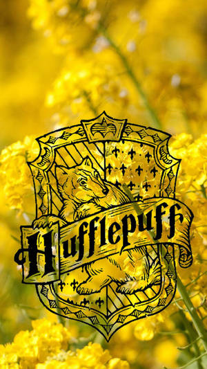 The Hufflepuff Crest – Loyalty, Hard Work, And Dedication Wallpaper