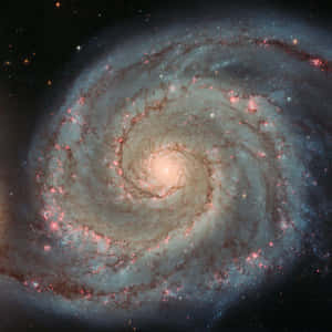 The Mesmerizing Whirlpool Galaxy In High Definition Wallpaper
