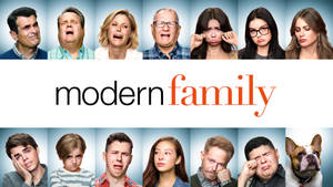The Modern Family Cast On The Dvd Cover Of Their Hit Sitcom Wallpaper