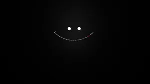 The Power Of A Black Smile Wallpaper