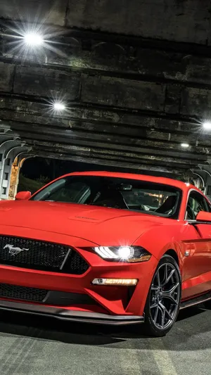 The Red 2019 Ford Mustang Gt Is Parked In A Tunnel Wallpaper