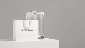 The Sophisticated Silver Rimowa Suitcase Wallpaper
