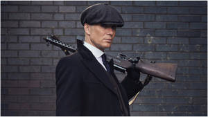 Thomas Of Peaky Blinders With Gun Wallpaper