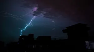 Thunderstorm Over Houses Wallpaper