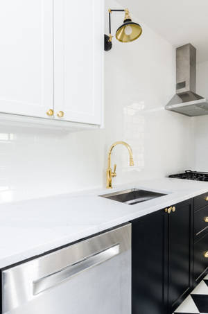 Tidy White And Black Kitchen Counter Wallpaper