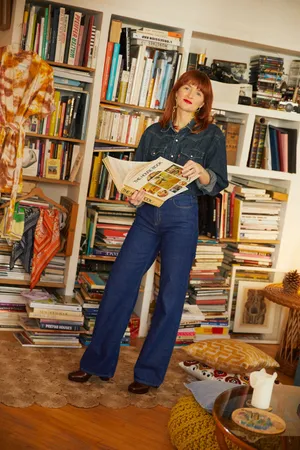 Tilted Photo Of Amélie Pichard At Home Wallpaper