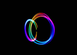 Time-lapse Photography Of Person Doing Circle Rainbow Light Wallpaper