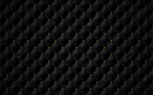 Timeless And Luxurious Black Leather. Wallpaper