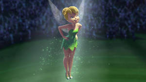 Tinkerbell Smiling In The Spotlight Wallpaper