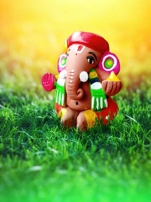 Tiny Clay Ganesh Mobile Wallpaper