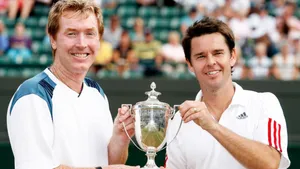 Todd Woodbridge And Small Trophy Wallpaper
