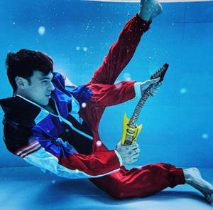 Tom Daley Fun Pool Shot Wallpaper