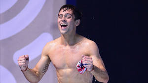 Tom Daley Happy Triumph Wallpaper