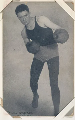 Tommy Loughran In Punching Pose Wallpaper