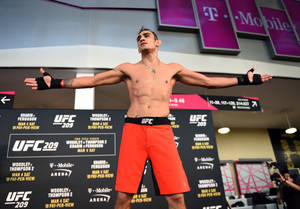 Tony Ferguson In Orange Shorts Wallpaper