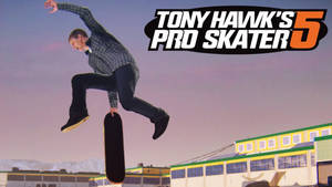 Tony Hawk Performing An Incredible Stunt On His Skateboard Wallpaper