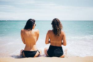 Topless Beach Bikini Duo Wallpaper