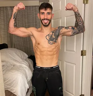 Topless Matheus Nicolau Doing Muscle Pose Wallpaper