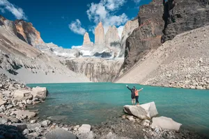 Torres Del Paine Hiker Celebration Wallpaper
