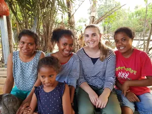 Tourist Interacting With Locals In Timor-leste Wallpaper