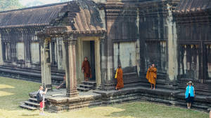 Tourists In Angkor Wat Cambodia Wallpaper