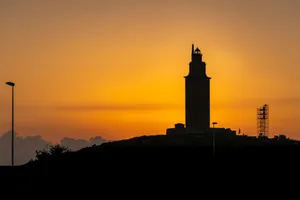 Tower Of Hercules At Sunset Orange Aesthetic Desktop Wallpaper