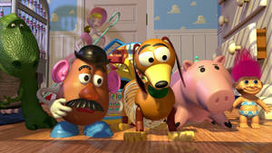 Toy Story Rex Beside Friends Wallpaper