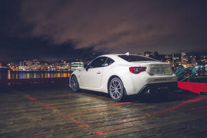 Toyota Car In Pier At Night Wallpaper