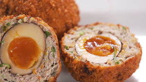 Traditional British Scotch Eggs Dish Macro Shot Wallpaper