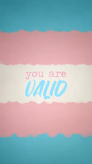 Transgender Person Surrounded By Beautiful Rainbow Colors Wallpaper